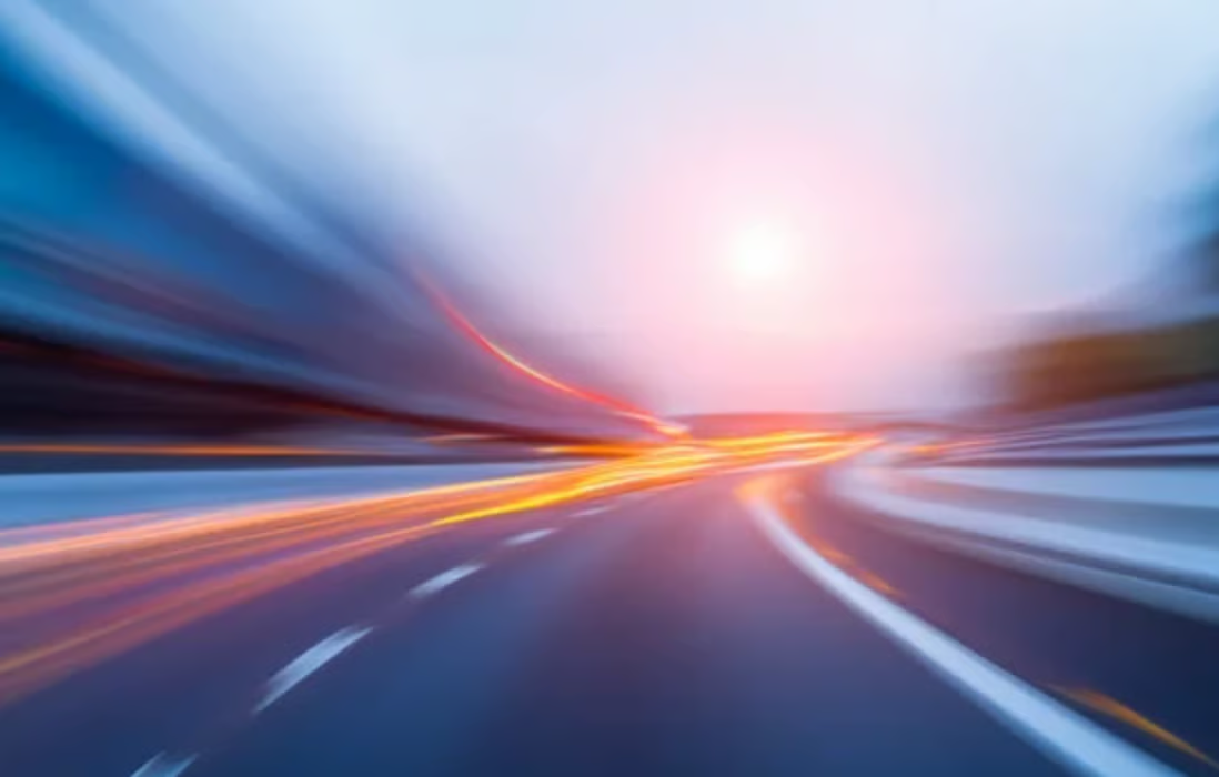 Light trails on a highway at dusk